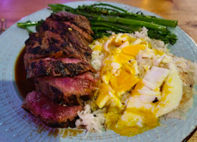 Salt Fish Restaurant and Tiki Bar signature dishes Marinated Steak
Coconut Kimchi
Yellow Curry Chicken Breast